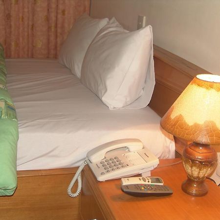 Eastgate Hotel Acra Habitación foto