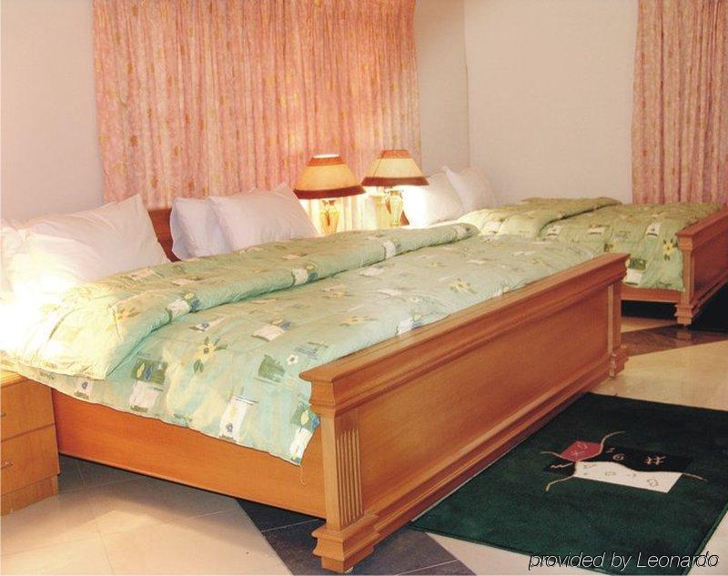 Eastgate Hotel Acra Habitación foto