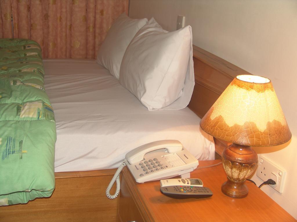 Eastgate Hotel Acra Habitación foto